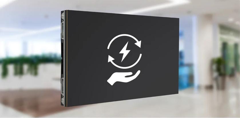 A flat screen displaying a graphic of a hand with a circular arrow and lightning bolt against a blurred indoor background.