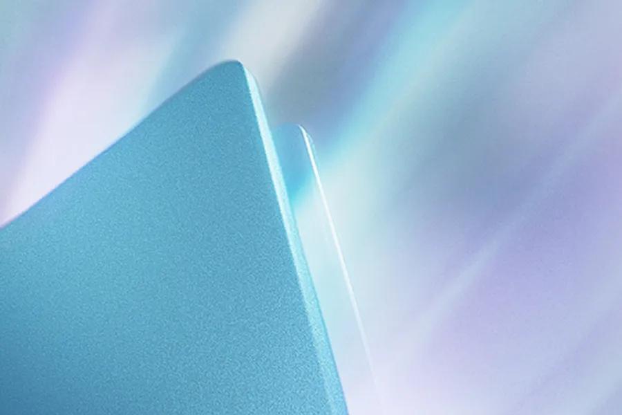 Abstract blue and turquoise triangular shapes with a gradient background.