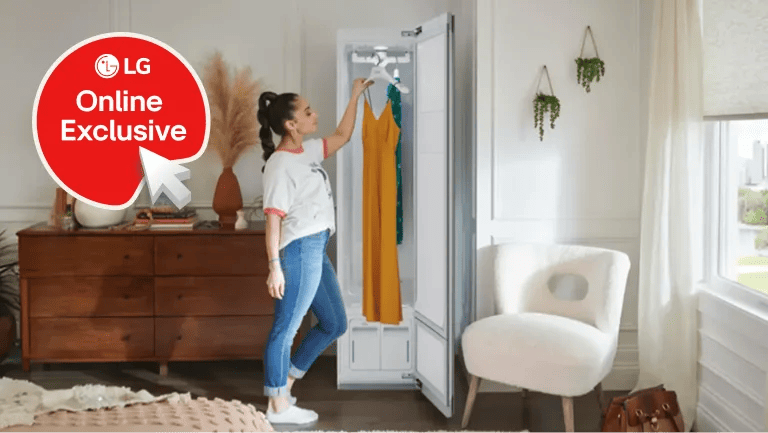 LG Styler Steam Closet with a woman placing garments inside, shown in a home room setting -- LG Online Exclusive
