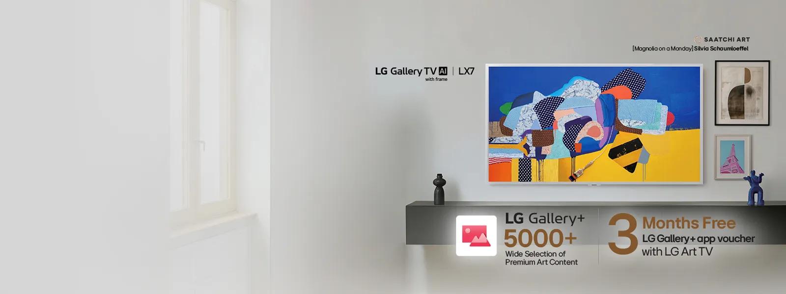 LG Gallery TV AI LX7 with frame mounted on a wall displaying colorful artwork, with framed art pieces alongside. SAATCHI ART [Magnolia on a Monday] Silvia Schaumloeffel. LG Gallery+ 5000+ Wide Selection of Premium Art Content. 3 Months Free LG Gallery+ app voucher with LG Art TV.