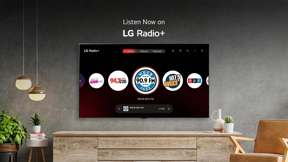 Living room with LG TV displaying LG Radio+ interface, showing station logos like NPR and 94.5.