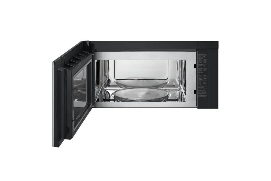 MHEU1738X Over-the-Range Microwave with door open showing stainless steel interior cavity and glass turntable plate