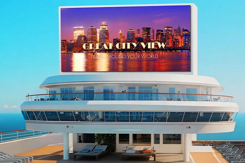 The GNPA series is prominently installed on the pool-facing wall of the LED support structure atop the Central Tower of a premium cruise ship, vividly displaying a cruise travel advertisement.