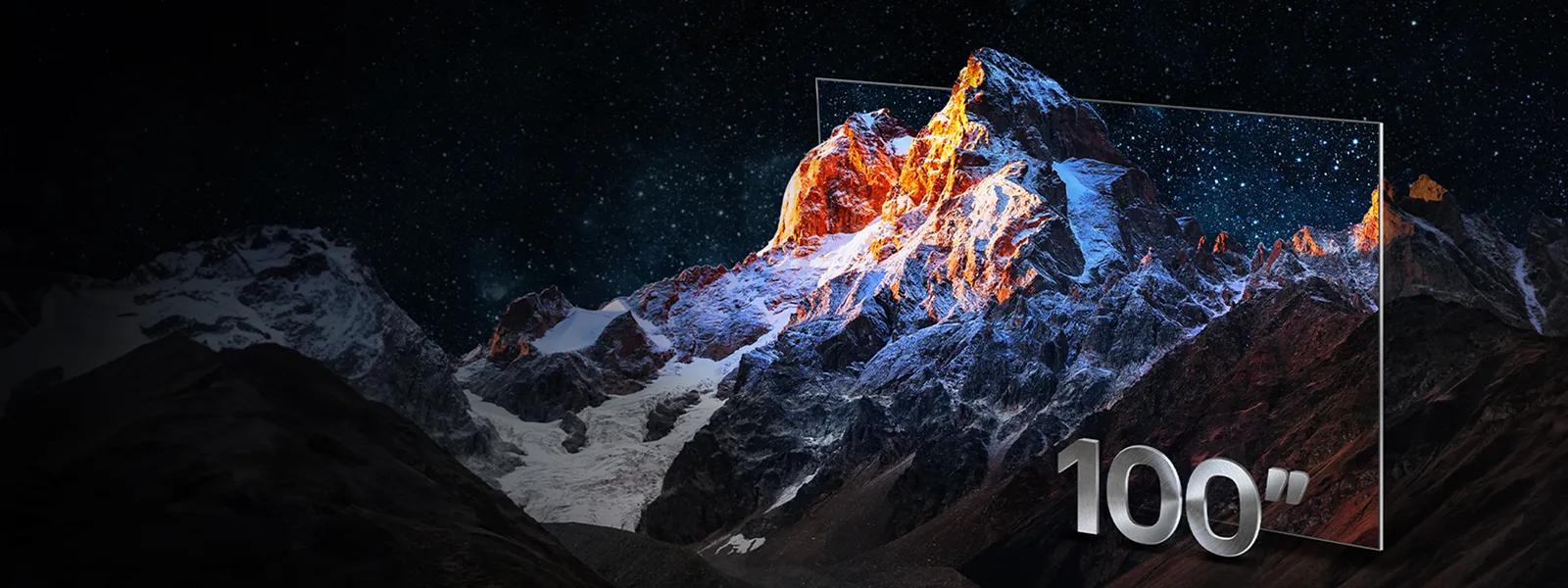 LG 100-inch TV displaying a stunning mountain scene in ultra-high resolution under a starry night sky.
