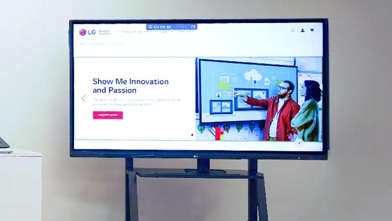 LG CreateBoard on display at the LG Atlanta Business Innovation Center. Its display shows the CreateBoard page of the LG website. 