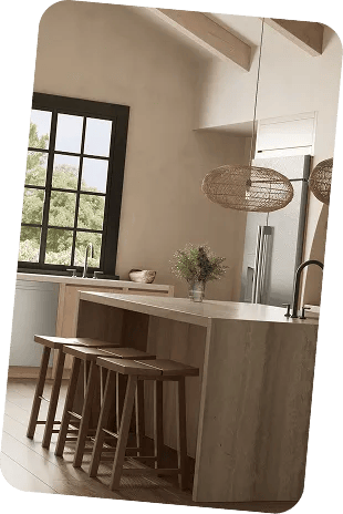 LG SIGNATURE laundry appliances in a bright, modern kitchen with natural wood island and pendant lighting