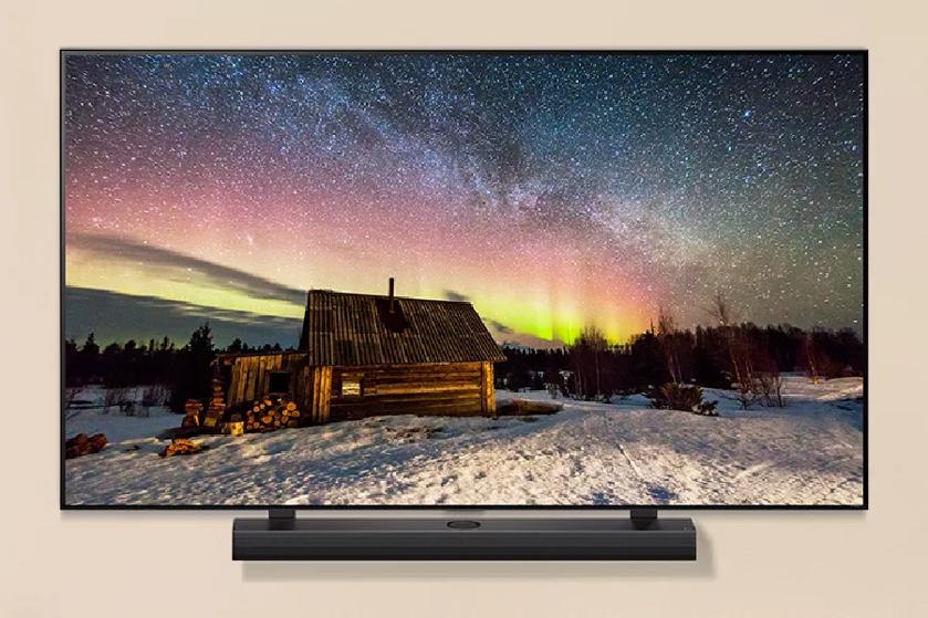 LG QNED MiniLED TV screen depicting scenic sky at daybreak