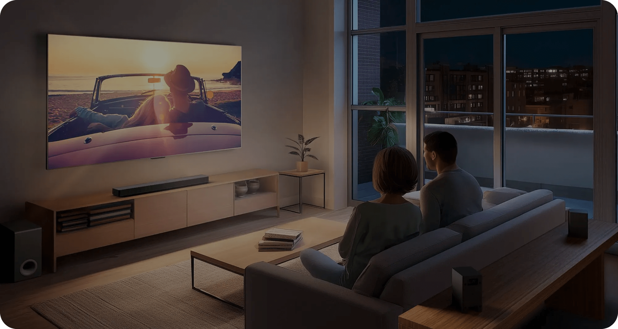 Modern living room at night with a family watching a sci-fi scene on wall-mounted TV, LG Soundbar below, and city lights visible through large windows.