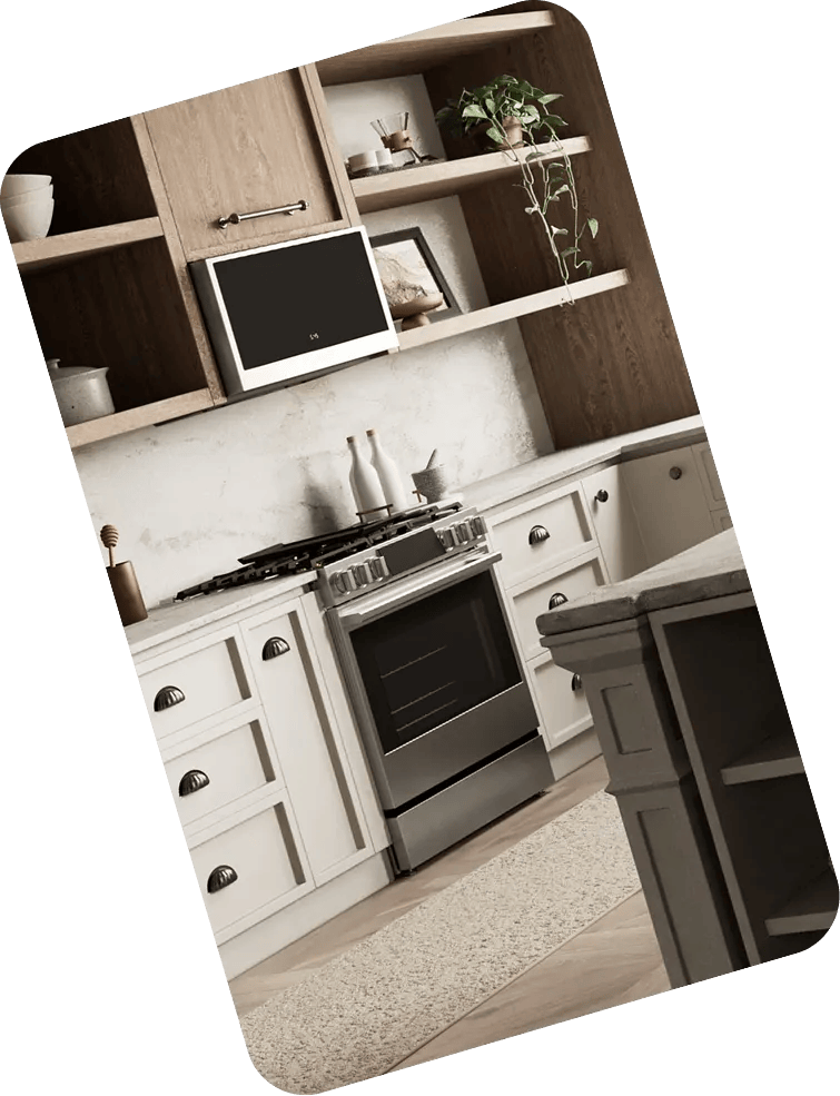 LG SIGNATURE range hood and induction cooktop installed in a kitchen with warm wood cabinetry