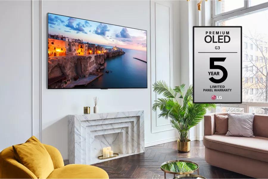A wall-mounted TV in a stylish living room. Premium OLED G3 5 Year Limited Panel Warranty logo.