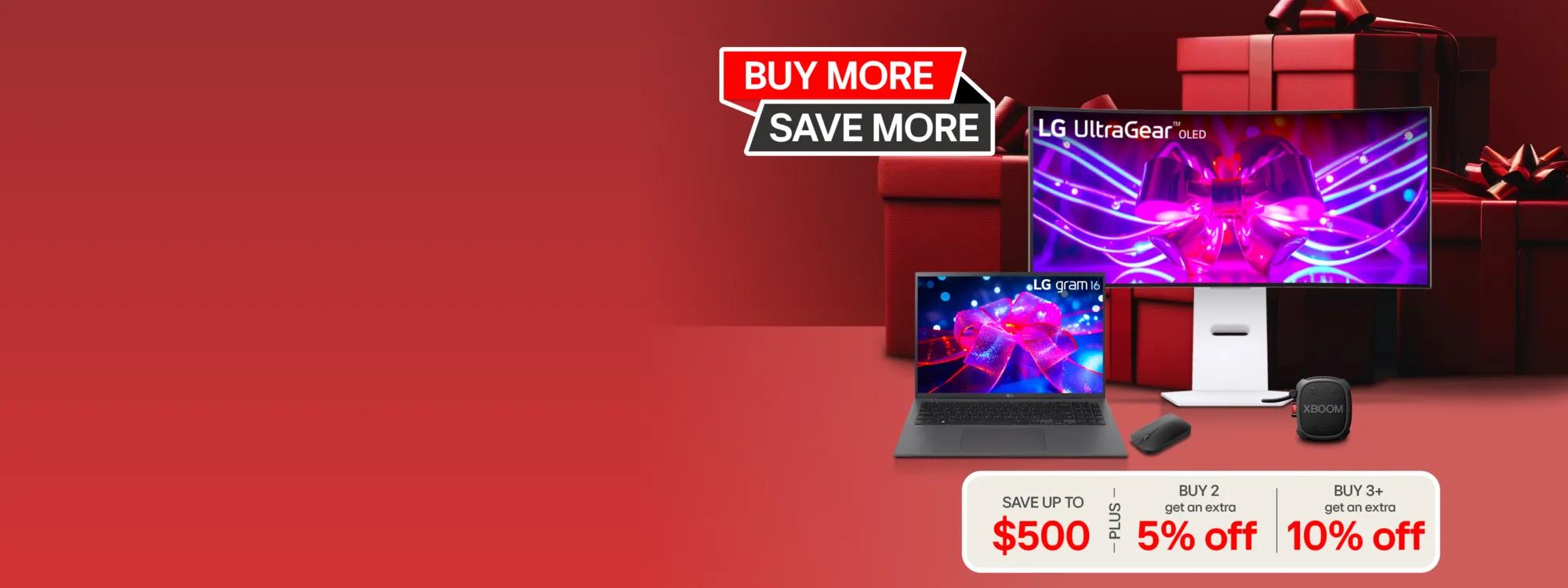 A red gift box containing a LG laptop and monitor, symbolizing a tech-themed present with buy-more-save-more deal.