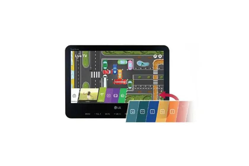 An LG hospitality TV displaying a colorful city  with a menu interface featuring colorful apps.
