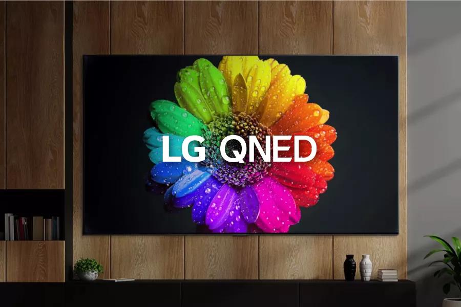 A vibrant, rainbow-colored flower with raindrops on the petals. LG QNED logo.