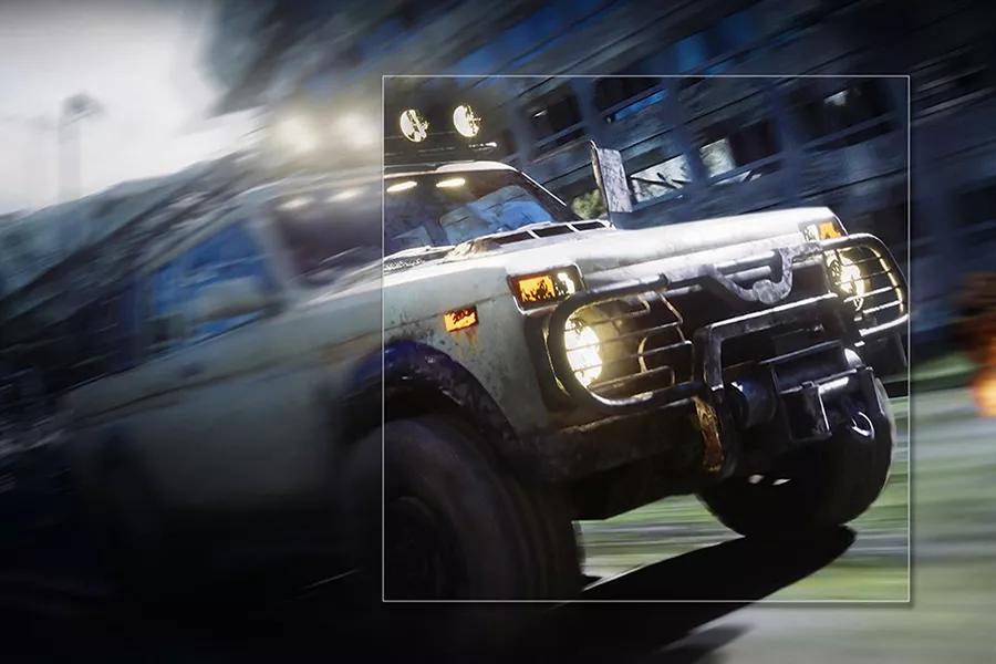 A jeep outrunning a T Rex dinosaur behind it