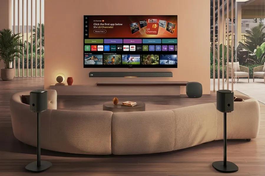 83-Inch LG C6 4K OLED TV OLED83C6HUP with Dolby Atmos Soundbar and wireless surround speakers in modern living room