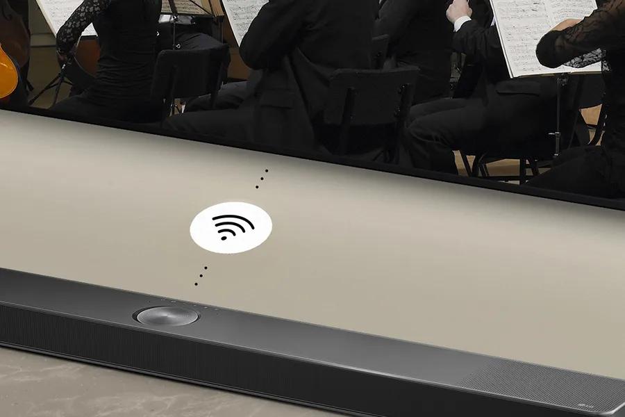 Soundbar showing wifi signals letting you see that there are no wires needed between the TV and soundbarfor Dolby Atmos