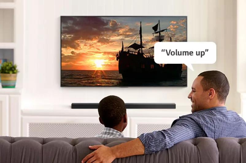 A man asking TV  Volume up to hear louder