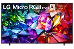 Faceted, crystal-like shapes in vivid rainbow colors on an LG Micro RGB screen.