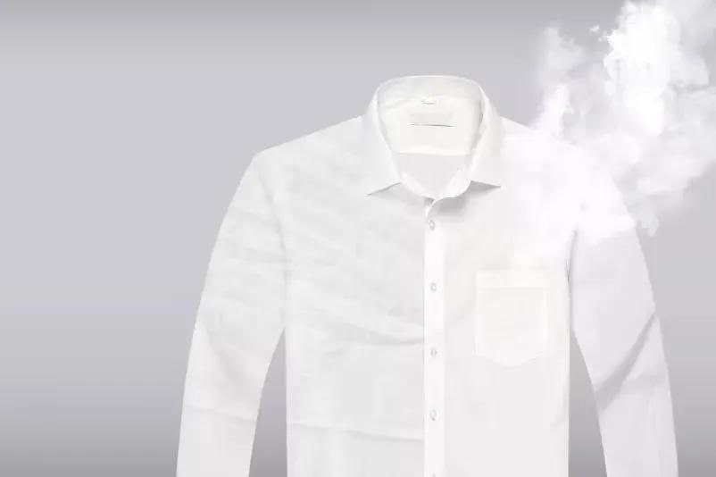 LG DLHC8402B Dryer with steam refresh feature showing white dress shirt with steam rising from fabric