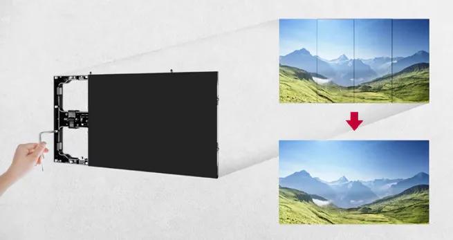 A display wall being adjusted from a grid of smaller screens to a seamless single image of a landscape.