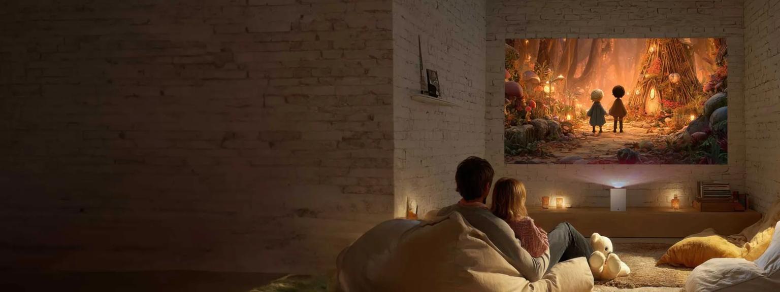 Parent and child watching a movie being projected by an LG CineBeam S projector.