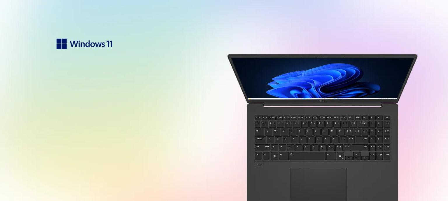 Open laptop displaying a blue abstract design on its screen with a Windows 11 logo on a pastel gradient background.