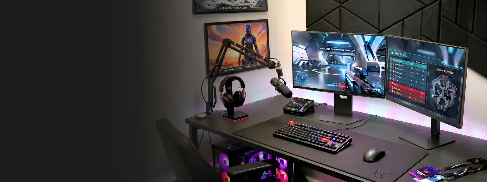2 LG Monitors appear on a desktop with various gaming gear including headphones, microphone, keyboard and mouse.
