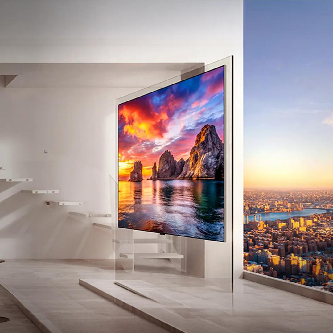 An OLED W6 TV displays an ultra-vivid nature scene within a stylish apartment showing the city skyline. “America’s Most Reliable Line of TVs” badge.