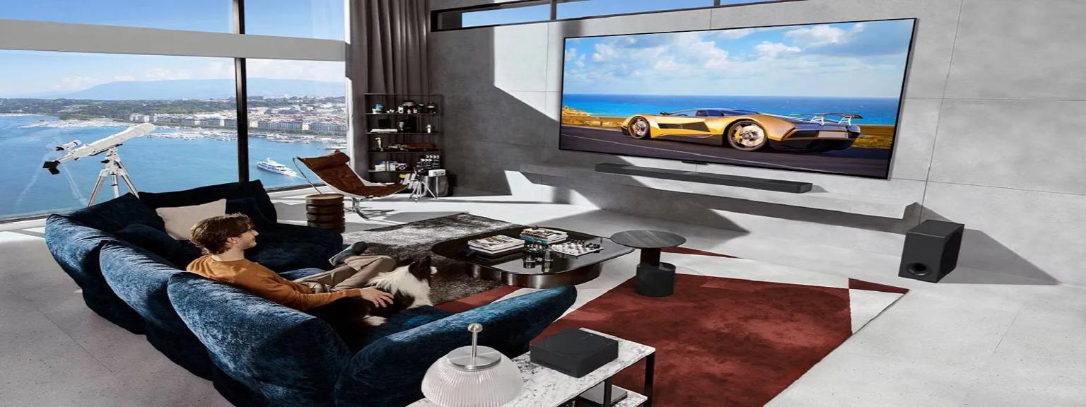 Luxurious living room featuring an LG AI TV and a top-tier sound system, delivering a cinematic experience with stunning visuals and immersive sound.