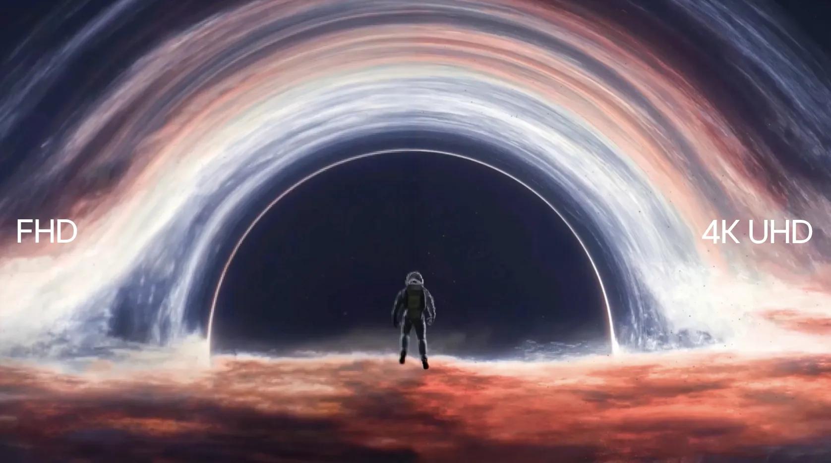 Dramatic image of an astronaut looking at the turbulent corona of a black hole. The image is split down the middle by an interactive slider, with left side labeled 'FHD' and less sharp and brilliant as the right side, which is labeled '4K UHD.' As the slider moves, the image changes sharpness.