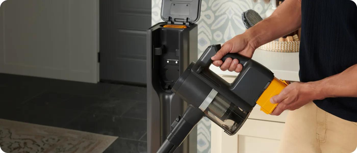 Person changing battery on LG CordZero Vacuum