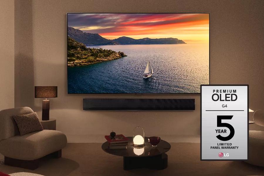 LG OLED TV in living room showing sailboat on water