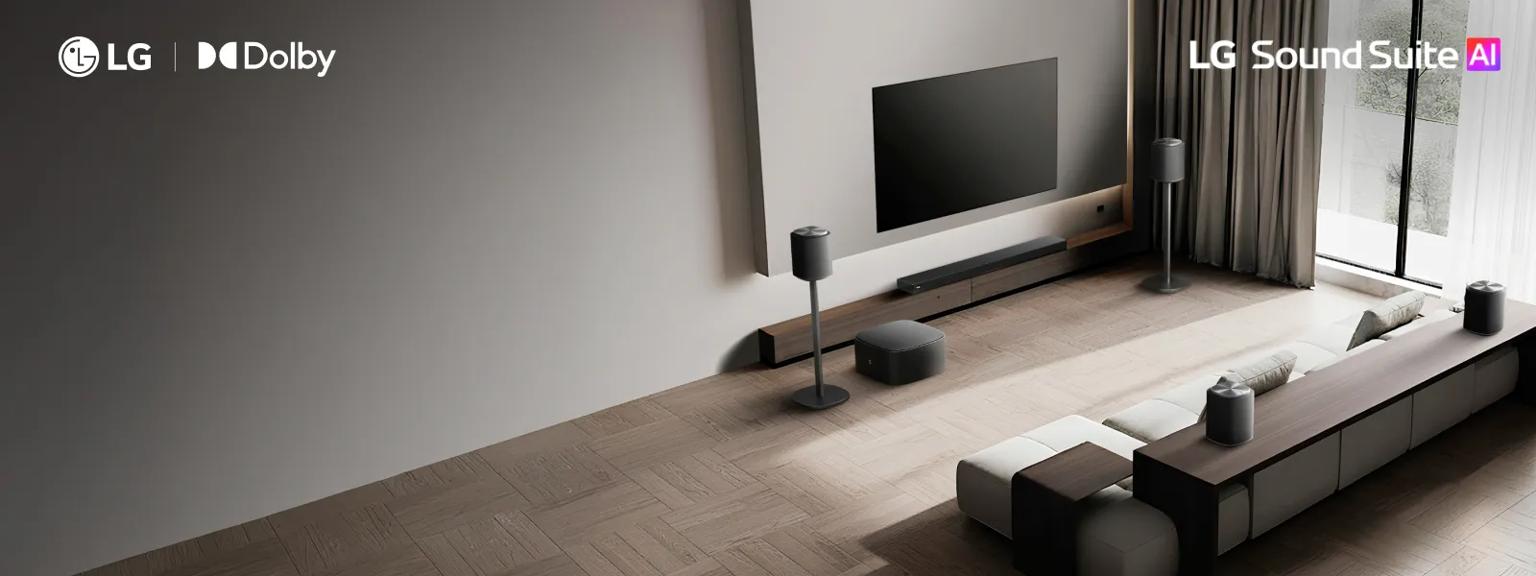 “LG Sound Suite AI” and “LG + Dolby” badges. A bright living room with an LG TV and soundbar setup.