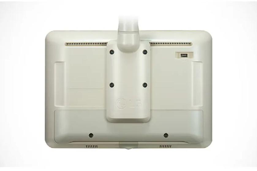 Rear view of a beige LG hospitality TV with a mounting bracket and USB port.