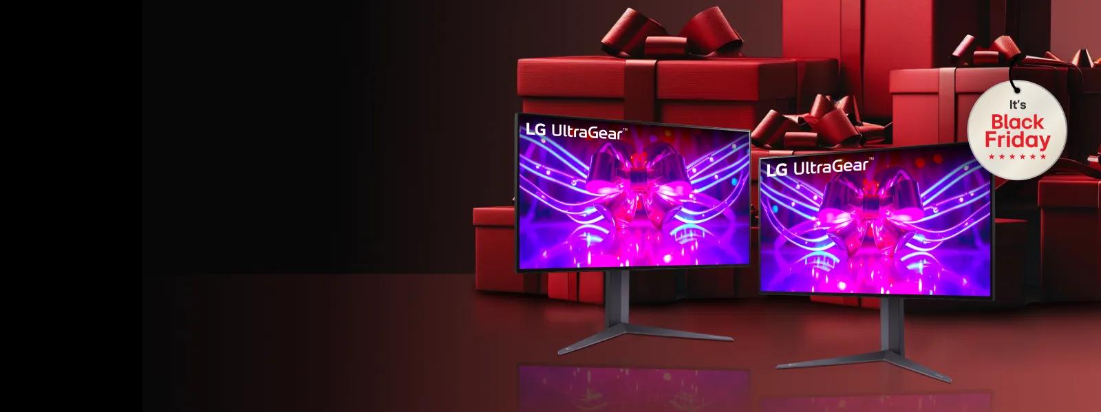 Black Friday emblem. Two UltraGear monitors side-by-side in front of unopened gift boxes.