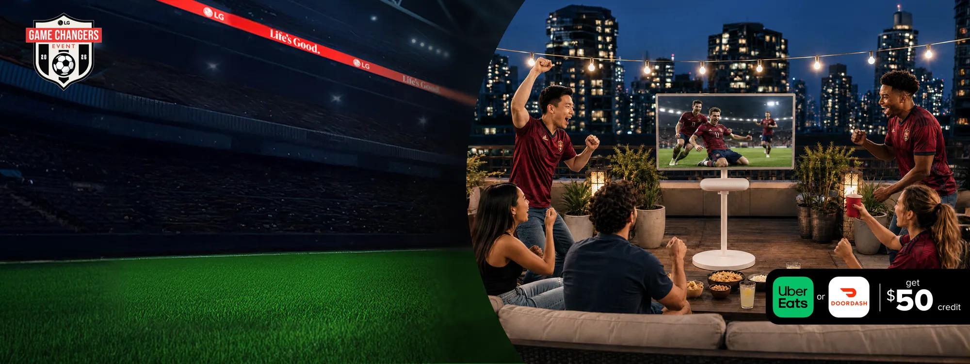 A group of friends cheer as they watch a soccer match celebration on an LG StanbyME 2 and speaker on a city rooftop surrounded by lit buildings. “Game Changers Event 2026” badge. Pop-out text reads “Uber Eats or DoorDash—$50 credit”. 
