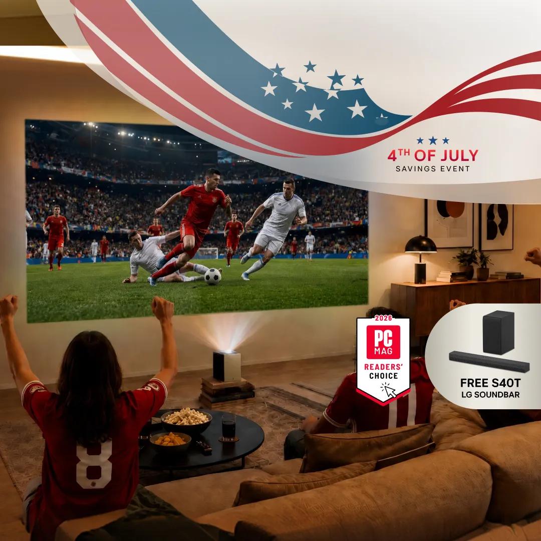 “4th of July Savings Event” title badge. A group of friends watch a soccer screen with an LG projector from a living room. “LG + America250: Proud Partner of America250”, “FREE S40T LG Soundbar” pop-out text. “2026 PC MAG Readers’ Choice” badge.