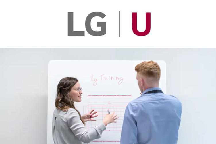 LG University hero people at whiteboard learning