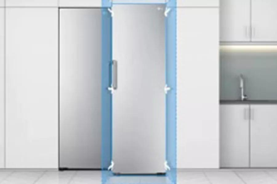 The single door counter depth refrigerator beside its freezer in a wall of surrounding white cabinets to demonstrate the seamless design of counter depth appliances.