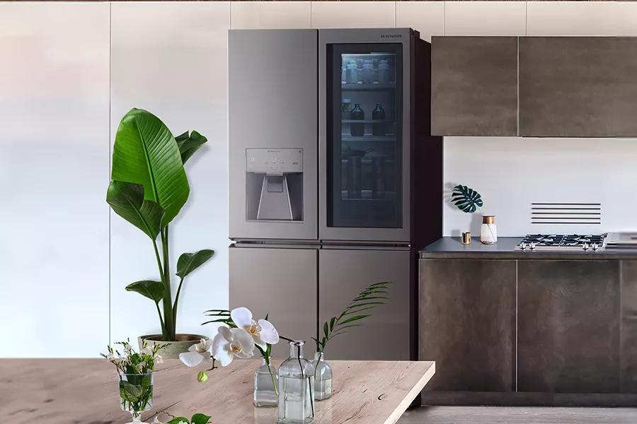 Apartment kitchen with LG Signature refrigerator