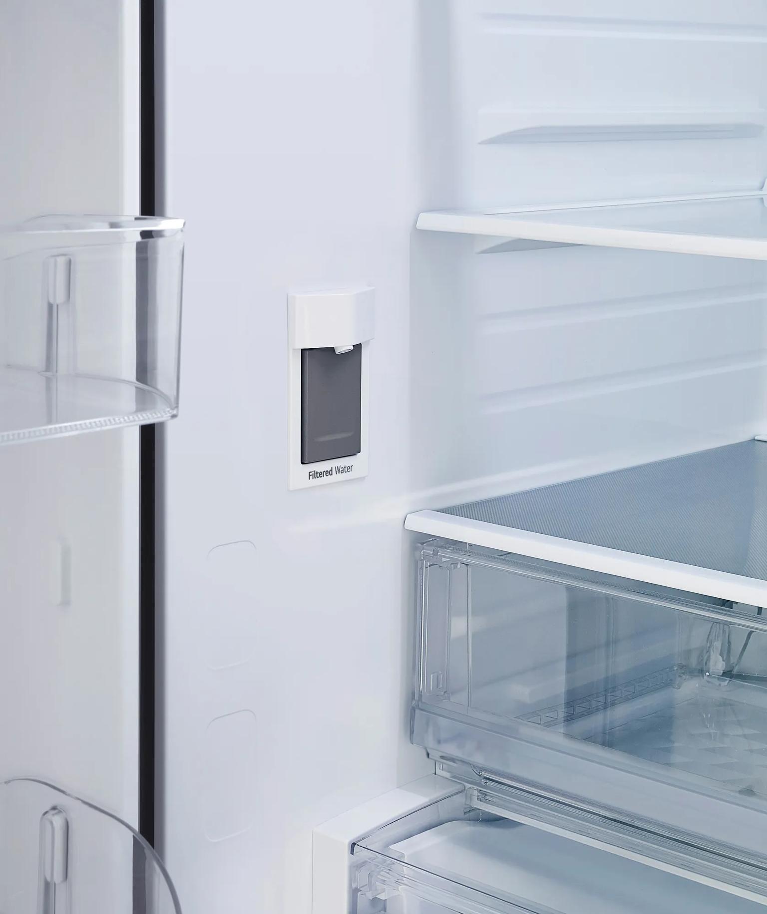 LG LRFLC2726S French Door Refrigerator interior with filtered water dispenser and adjustable shelves