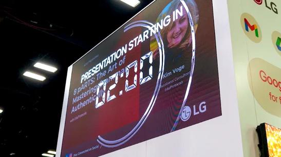 LG All-in-One Direct View LED at the top of the LG booth at ISTE. It's displaying a countdown timer over a graphic for an upcoming presentation. There are two minutes left on the timer. 