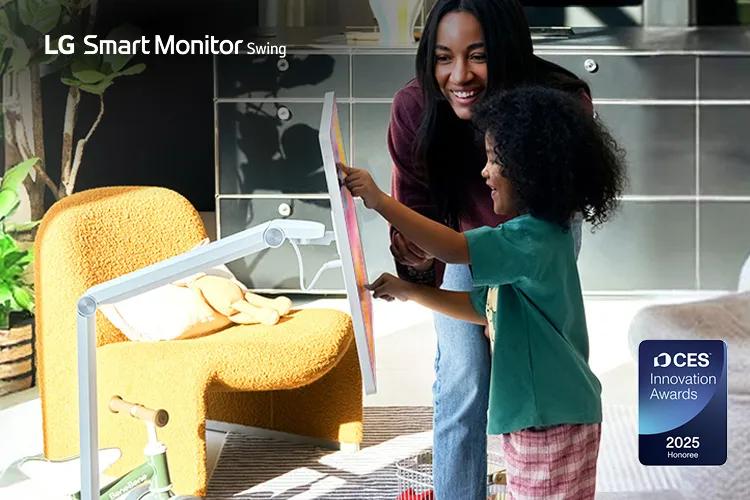 Smiling woman and child using an LG Smart Monitor Swing in a sunlit living room. Below is a badge that says 'CES Innovation Awards 2025 Honoree'