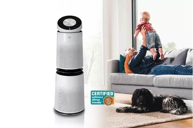 Air purifier next to a father and son on the couch  AAFA Certified LG Air Purifiers