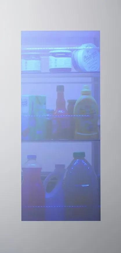 Interactive feature showing an InstaView panel on the left and a color-selection interface on the right. Users can choose from five LED lighting options: Emerald Green, Sapphire Blue, Amethyst Purple, Ruby Red, or Citrine Orange. When a color is selected, the name of that hue appears and the InstaView window reveals the inside of the fridge illuminated in that chosen color.