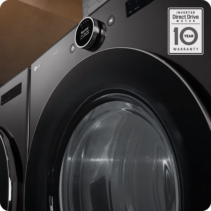 A close-up shot of an LG front load dryer. A gray badge in the top left corner says 'Inverter Direct Drive Motor 10-Year Warranty.'
