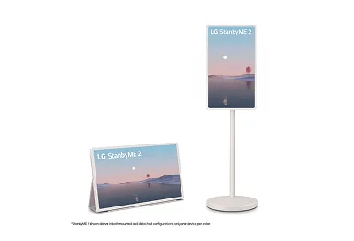 The LG StanbyME 2 is shown on its stand and its folio case modes. It has an image of a desert sunset on the screen.
