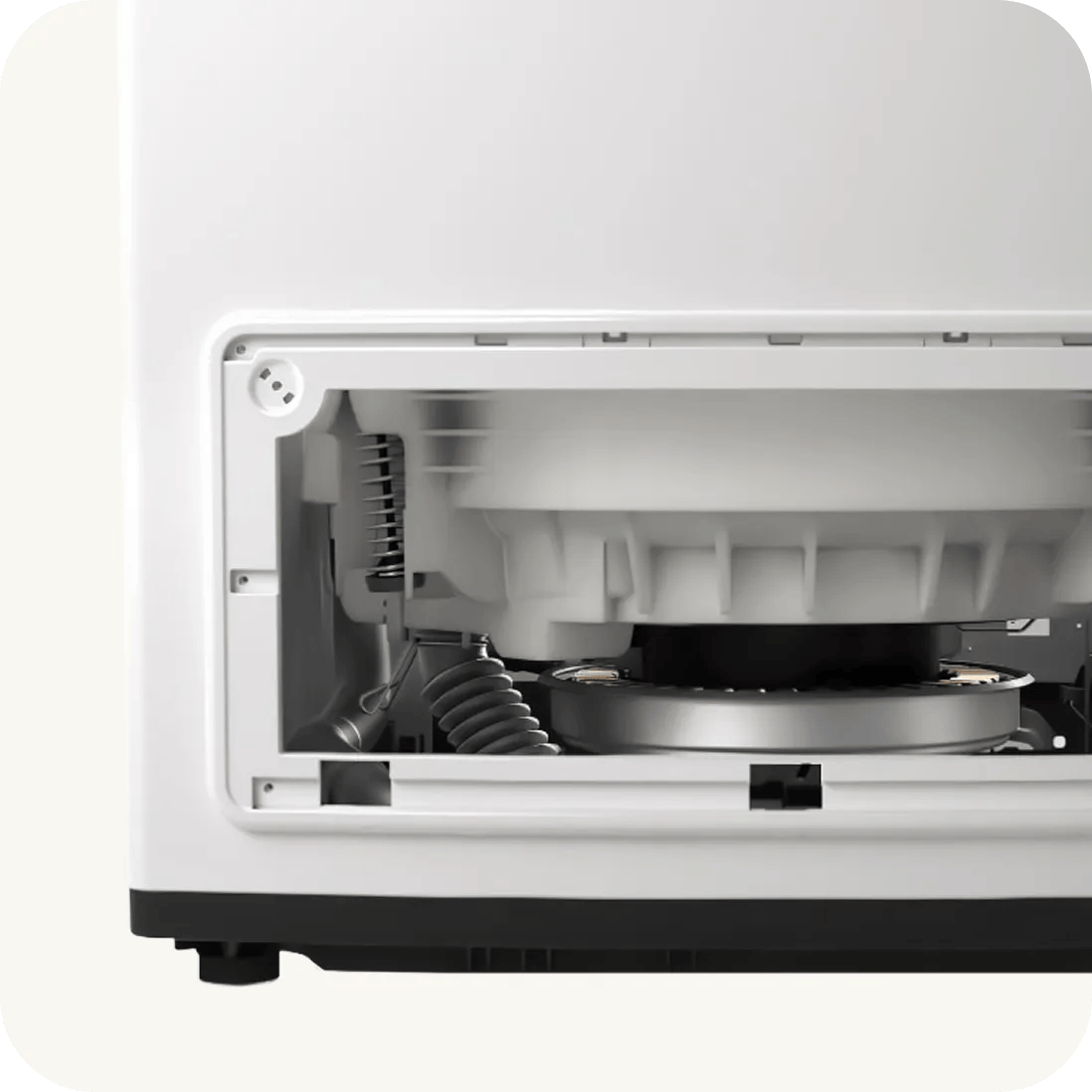 LG commercial washer with access panel open revealing internal motor and drum components