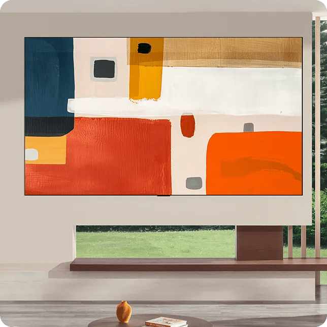 In a modern living space with expansive windows and clean architectural framing, the LG OLED evo G6 Gallery TV appears integrated into the wall, showcasing a large-scale abstract painting in layered neutrals, orange and blue.