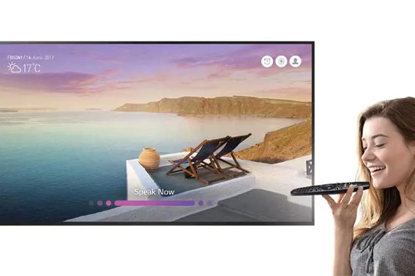 A hotel guest controls the LG Hospitality TV through voice control.